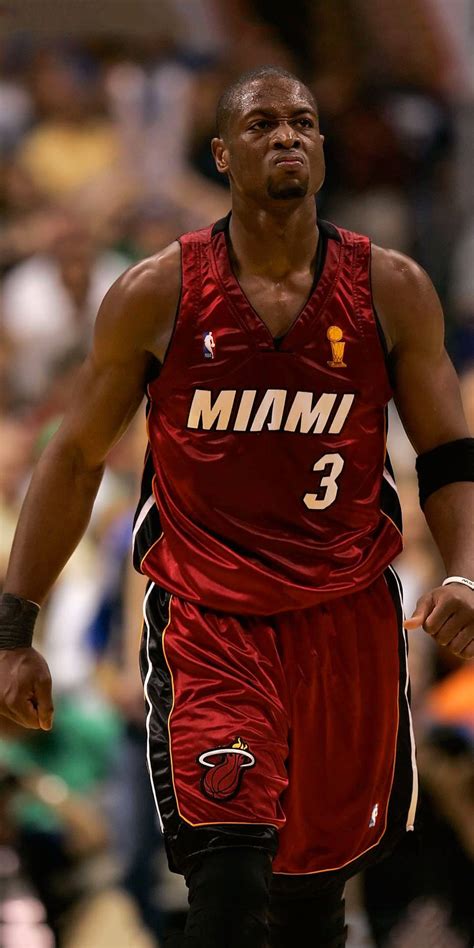 Download Miami Heat Dwyane Wade Fierce In Red Jersey Wallpaper