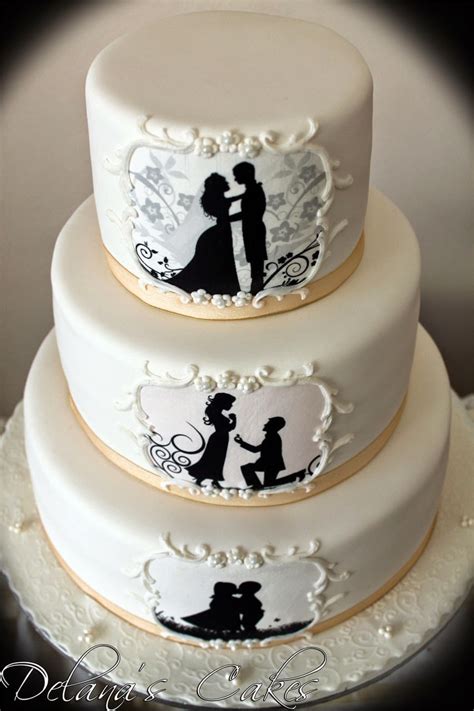 Please take note, that all efforts are taken, to obtain the same results as the pictures, but from time to time certain decorations may differ, due to the nature that all are handmade & no two items are exactly the same. Delana's Cakes: Silhouette Wedding Cake