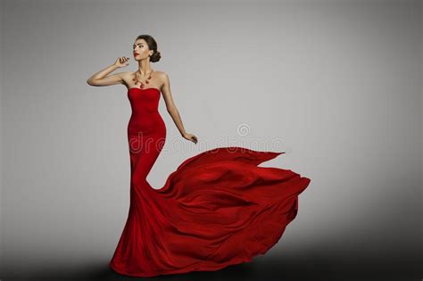 Woman Red Dress Fashion Model In Long Waving Silk Gown Stock Photo Image Of Glamour Elegance