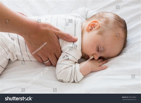 Mom Putting Baby Sleep Baby Bed Stock Photo 585270833 Shutterstock