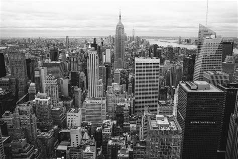 Grayscale Photo Of City Buildings · Free Stock Photo