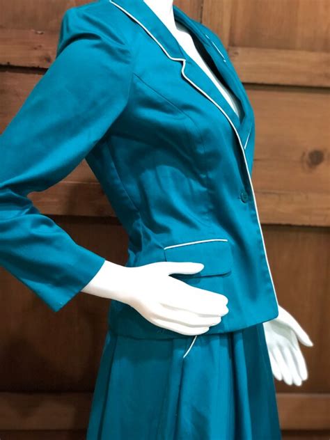 turquoise blue skirt suit 70s office attire sexy se… gem