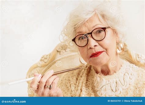 Serious Old Woman Smoking Cigarette Stock Image Image Of Adult Indoor 86553701