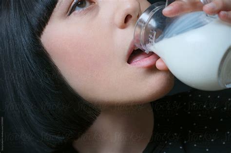 Beauty Drinking Milk Closeup By Stocksy Contributor Sonja Lekovic