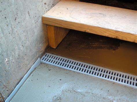 A basement drain backing up is fixable by knowledgeable sewer and drain professionals. The TrenchDrain™ Grated Drainage System