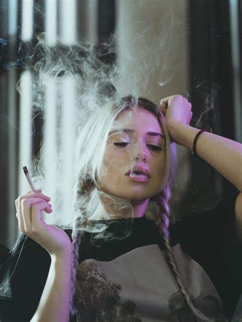 A Pretty Woman Smoking · Free Stock Photo