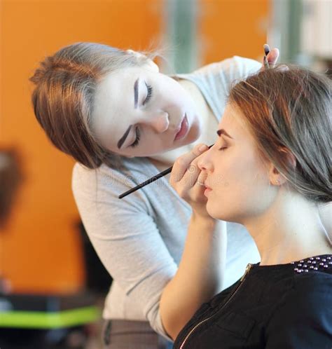 Closeup Of A Makeup Artist Applying Makeup Stock Photo Image Of