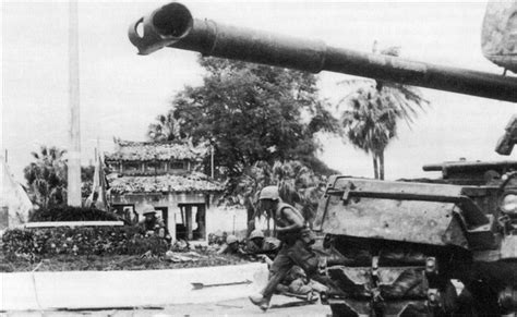 Us Marines Advance Past An M48 Patton Tank During The Battle For Huế