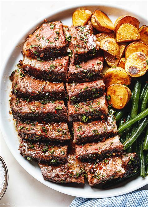 Immediately, add the butter, thyme, rosemary, and garlic, swirling the pan to melt the butter quickly. Garlic Herb Butter Steak Recipe in Oven - Oven Roasted ...
