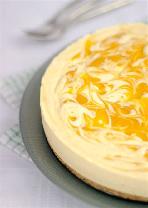 Slide two long metal cake spatulas underneath the cheesecake and transfer it to. Mango & White Chocolate Cheesecake | Step by Step Picture ...