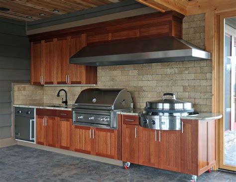 The outdoor kitchen cabinets are literally the star of the show. Diy Tile Countertop 10 Diy Outdoor Kitchen Design Maple ...