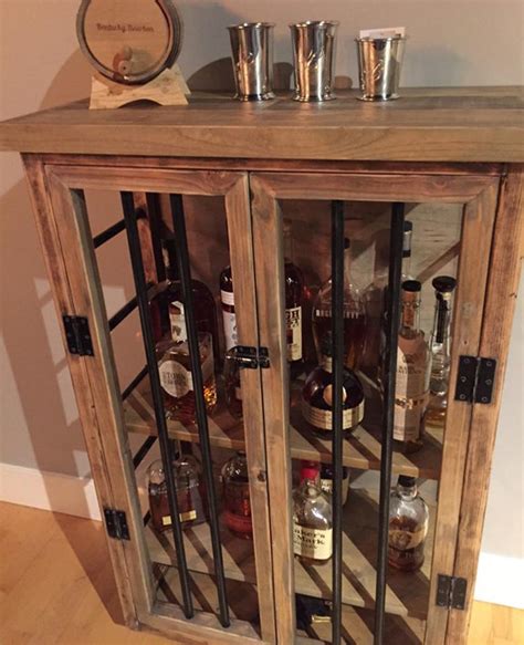 Potterybarn.com has been visited by 100k+ users in the past month Liquor Cabinet Rustic Iron and Wood with Natural ...