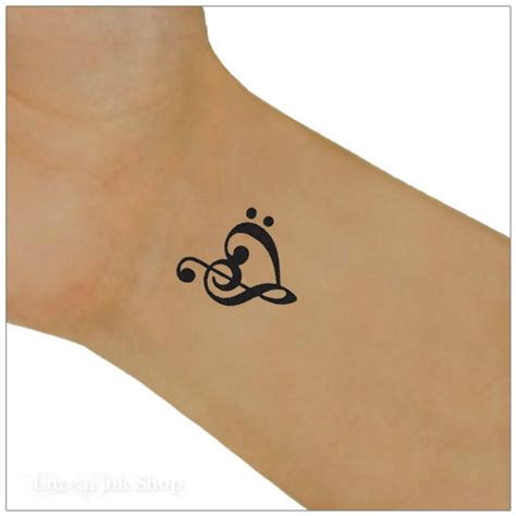 Heart Music Note Tattoos On Wrist