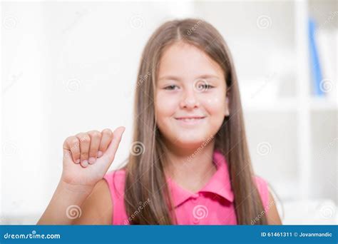 Smiling Deaf Girl Learning Sign Language Royalty Free Stock Photo