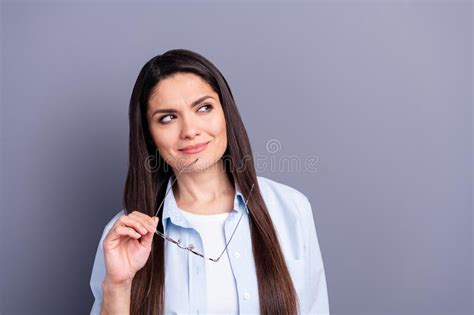 Photo Of Dreamy Sweet Mature Woman Wear Formal Shirt Arm Spectacles Looking Empty Space Isolated