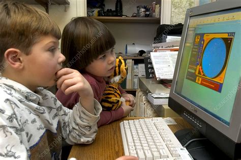 Children Playing A Game On A Computer Stock Image T4850055