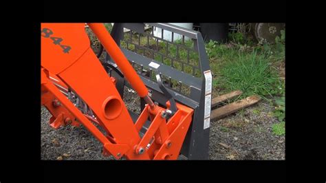 Demonstrating A Kubota Quick Attach Loader Youtube