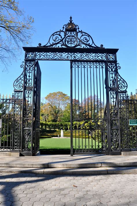 A secluded oasis, just a few steps from 5th ave. The Conservatory Garden in Central Park, NYC. Its gates ...