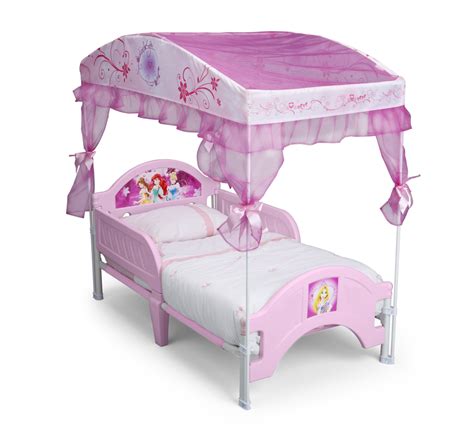 A standard toddler mattress is 28 wide by 52 long and 6 in depth. Delta Children Disney Princess Canopy Toddler Bed - Baby ...