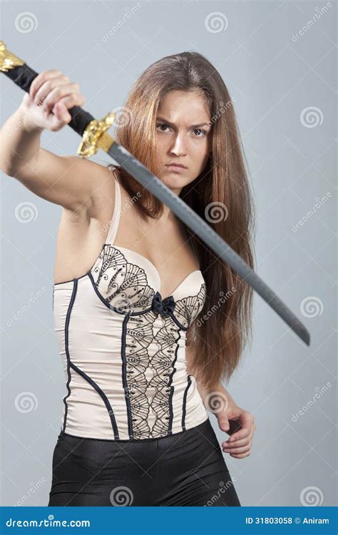 Woman With Sword Fighting Royalty Free Stock Image