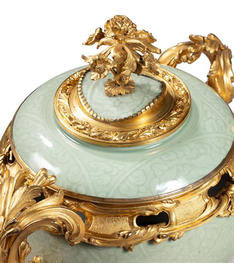 A Pair Of Gilt Bronze Mounted Chinese Celadon Pot Pourri Vases The