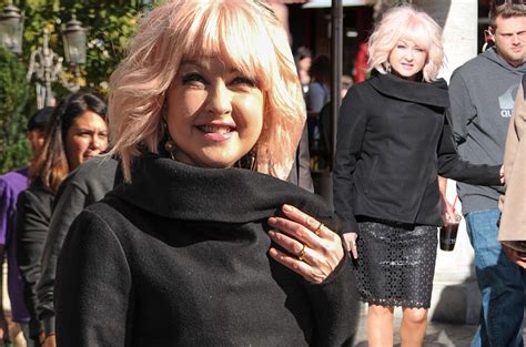 Cyndi Lauper 59 Shows Off Her Quirky Style With Pink Hair And Cut Out Pattern Skirt For