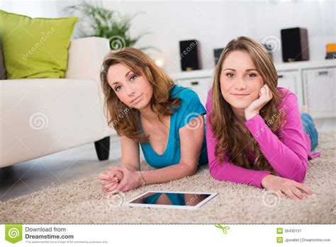 Two Beautiful Girls Having Fun At Home Stock Image Image Of Computer Female 39430137