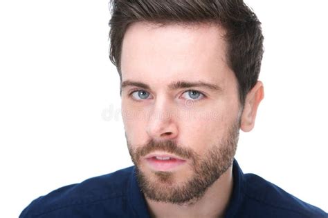 Portrait Of A Young Man With Beard Looking At Camera Stock Photo