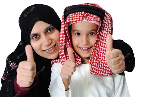 Premium Photo Arabic Muslim Mother And Son With Thumb Up