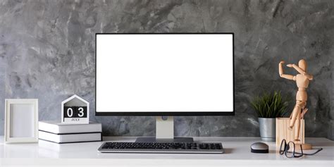 Blank Screen Desktop Computer In Minimal Office Room With Decorations