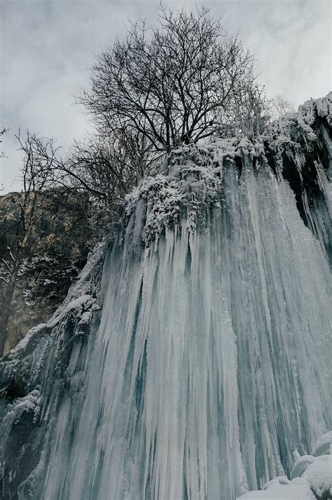 Frozen Waterfall In Cold Winter Wonderland By Stocksy Contributor