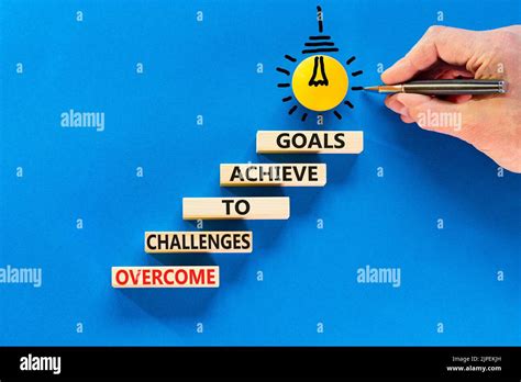 Overcome challenges to achieve goals symbol. Concept words Overcome