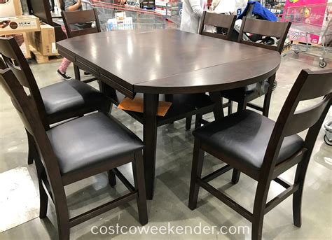 The dining room table is where friends and family come together over a bountiful meal to share stories, trade jokes and catch up. Bayside Furnishings 7-piece Counter-Height Round Drop-Leaf ...