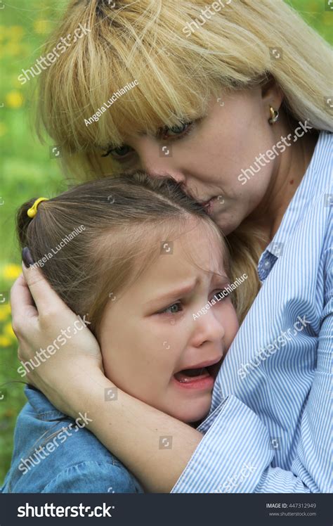 Mother Comforting Crying Daughter Outdoor Stock Photo 447312949