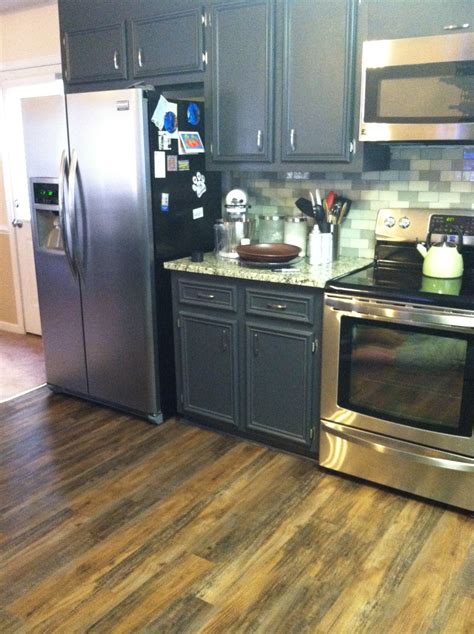 Vinyl wood floors!!! Looks and feels like wood at a third of the cost