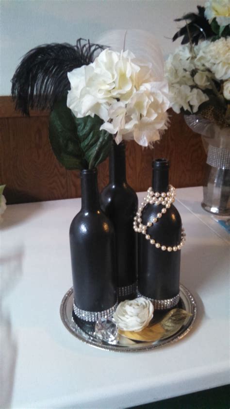 These repurposed wine bottle centerpieces are great to set on your garden table. 4af5487f0a1e652ab91bab4efbeb109f.jpg (736×1308) | Wine ...