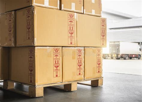 Packaging Boxes Stacked On Pallet Loading With Shipping Cargo Container Supply Chain Cargo