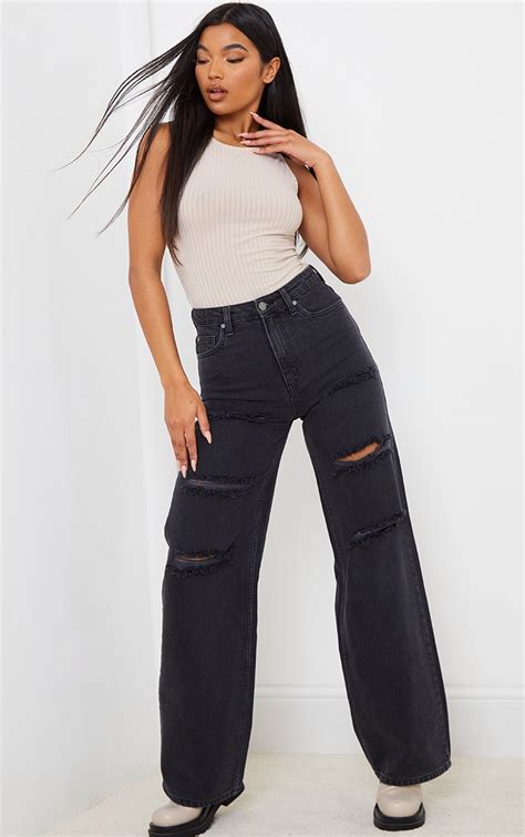 Washed Black Ripped Wide Leg Jeans Prettylittlething Uae