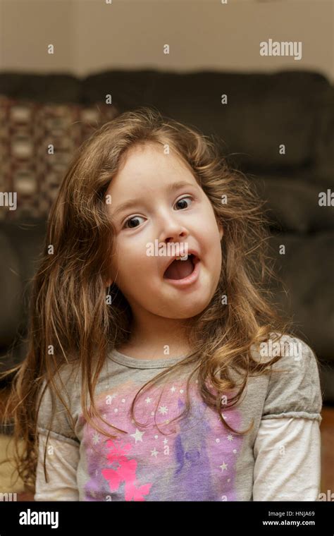Little Girl Making Funny Faces Stock Photo Alamy