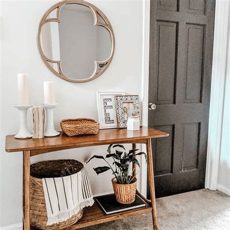 Eclectic Boho Entry Way With Black Doors And Thrifted