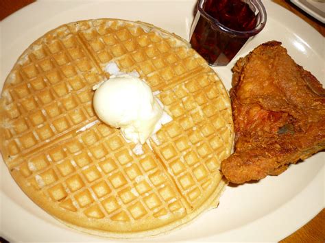 Thurston waffles is a white cat known for a distinctive and loud meow. Roscoe's House of Chicken 'n Waffles | Roadfood