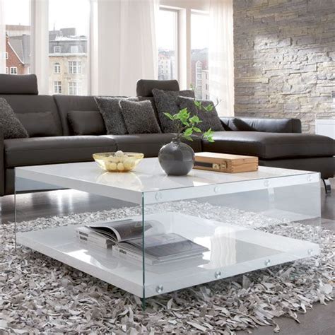 No one should ever have to shout, lean forward, or crane their necks in order to have a regular pulling the furniture away from the walls will make conversation areas more intimate and create a how about sitting on the couch with a glass of wine or coffee? Stylish 2 tier design rectangular glass coffee table ...