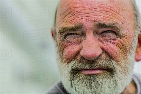 Close Up Of Wrinkled Face Of Caucasian Man Stock Photo Dissolve