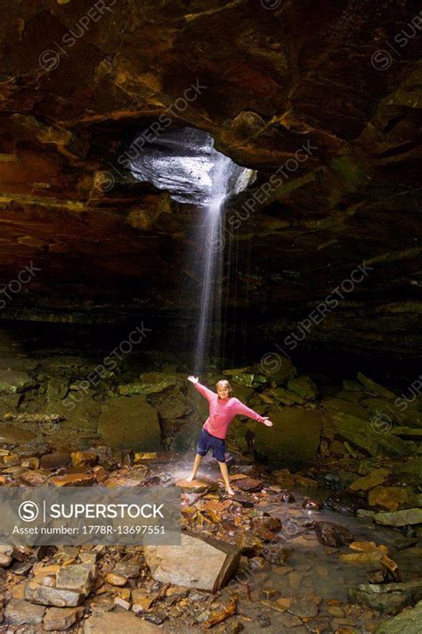 A Young Girl Standing Below The Glory Hole Ozark National Forest