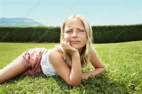 Curious Girl Laying In Grass Stock Image F0049701 Science Photo