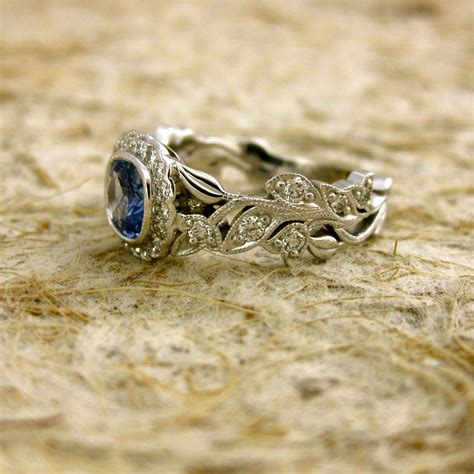 Light Blue Sapphire Engagement Ring In 14k White Gold With