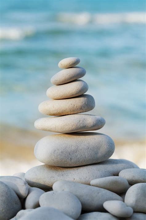 Stack Of White Pebbles Stone Against Sea For Spa Balance Meditation