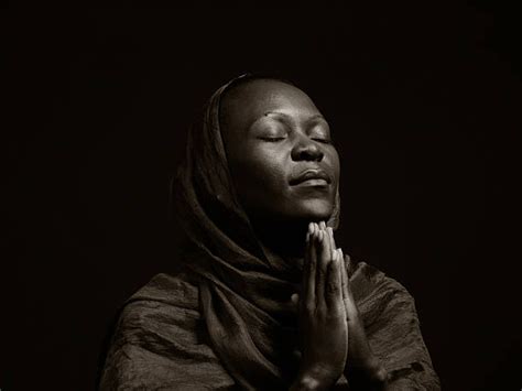 Black Woman Praying Photos And Premium High Res Pictures Getty Images Woman Praying