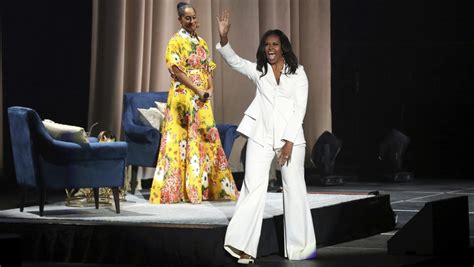 6 Power Dressing Tips To Learn From Michelle Obamas Book Tour
