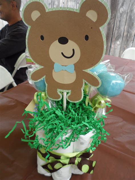 Prop the teddy bear on top of the box, it should appear as if it is holding the balloon stick with both hands. Cute baby shower center piece! | Baby shower centerpieces ...